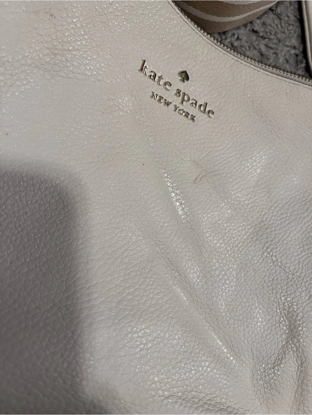 kate spade white pebbled leather crossbody with striped tan strap and coin pouch